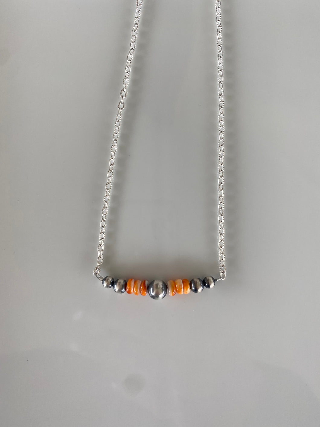 Orange Spiny Bar necklace